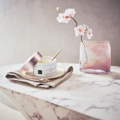 RITUALS Ritual of Sakura body scrub texture close-up shows exfoliation-ready grains.