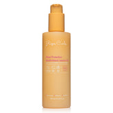 Rizos Curls multivitamin leave-in bottle closeup showcasing nourishing heat protection