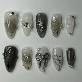 ROFIBUT black gradient press-on nails with glossy finish for quick at-home manicures.