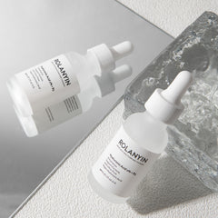 ROLANYIN Hyaluronic Acid 2% + B5 Serum swirl on skin emphasizes smooth, hydrated texture.