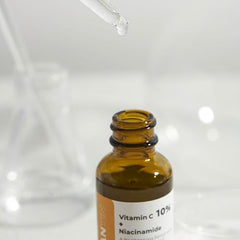 ROLANYIN Serum being applied to hand for non-greasy hydration in a skincare routine.