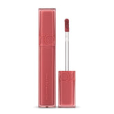 rom&nd DEWYFUL Water Tint coral lip swatch showing glossy, long-lasting color