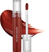 romnd massive lip oil on lips shows a smooth color and glassy shine for everyday wear.