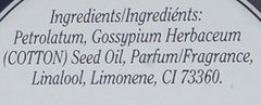 Rosebud Perfume Lip Salve Rosebud 2-pack creamy balm on finger for quick lip care.