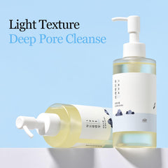 ROUND LAB 1025 Dokdo Cleansing Oil bottle in pump-dispense action for easy application