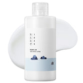 ROUND LAB 1025 Dokdo Lotion bottle closeup showing hydrating formula