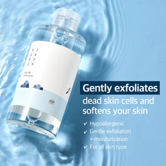 ROUND LAB Dokdo toner texture shot highlights a clear, refreshing liquid for quick skincare steps.