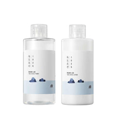 Round Lab Dokdo Toner bottle pour demonstrates hydrating, gentle exfoliation preparation.