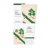 ROUND LAB Mugwort Calming Cleanser bottle closeup highlights soothing, low-pH cleanse for sensitive skin.