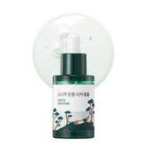 ROUND LAB Pine Calming Cica Ampoule bottle delivering soothing hydration for sensitive skin barrier support.