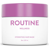 Routine Wellness hair mask bottle with rose hips for nourishing repair and hydration.