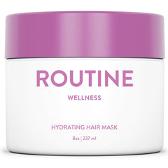 Routine Wellness hair mask bottle with rose hips for nourishing repair and hydration.