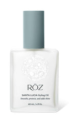ROZ Santa Lucia Styling Oil bottle closeup, showcasing lightweight nourishment for all hair types.