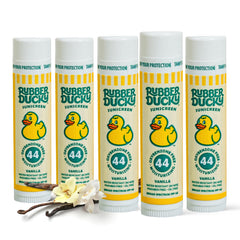 Rubber Ducky lip balm SPF 44 vanilla swatch on lips for smooth protection.