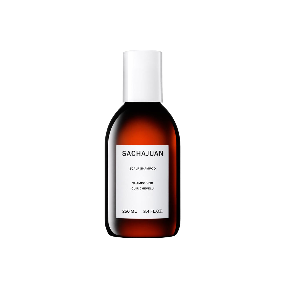 SACHAJUAN scalp shampoo bottle showcases sleek design for soothing scalp care.