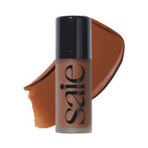 Saie Dew Bronze bottle cap close-up for precise, mess-free application.