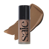 Saie Dew Bronze close-up with doe-foot applicator for precise sun-kissed glow