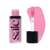 Saie Dew Liquid Blush packaging close-up highlighting portable design for easy touch-ups.
