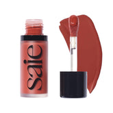 Saie Dew Liquid Blush spicy wand-dots shows precise placement for natural flush