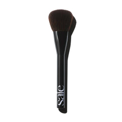 Saie Powder Blush Brush closeup shows ultra-soft bristles for precise, diffused color