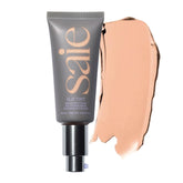 Saie Slip Tint SPF 35 application close-up showing lightweight glow and hydration