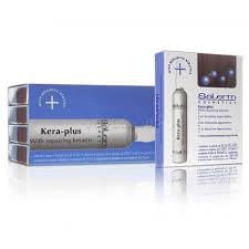 SALERM Kera-Plus repairing keratin bottle pour demonstrates pre-styling protection for heat-based tools