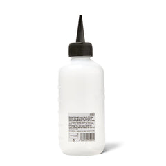 Salon Care Narrow Tip Applicator Bottle demonstrates precise application for accurate color placement