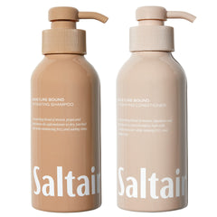 Saltair Moisture Bound shampoo bottle highlights rich lather for hydrated hair.
