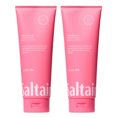 saltair pink beach body lotion tube being applied for long-lasting hydration.