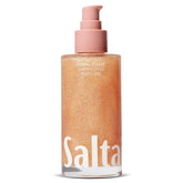 Saltair Shimmering Body Oil bottle pouring shimmer for radiant skin