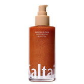 Saltair Shimmering Body Oil bottle displaying Santal Bloom glow and hydration