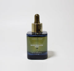 Sand + Fog Marshmallow Skies dark blue bottle highlights a concentrated parfum oil for intimate wear