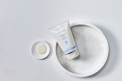 Sanitas Lemon Cream Scrub texture application demonstrates even distribution for dual action exfoliation.