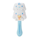 Sanrio Cinnamoroll hair brush close-up showing bristles for gentle detangling during styling