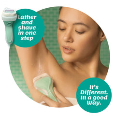 Schick Intuition aloe conditioning foam on the razor for moisture during shave.