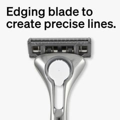 Schick Quattro lubricating strip with Aloe, Vitamin E, Vitamin B5 in view.