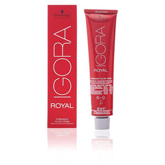 Schwarzkopf Royal Igora 6-0 application brush applying shade precisely.