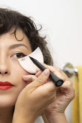 ShadowMoon fallout-catching shield captures fallen powder during makeup application.