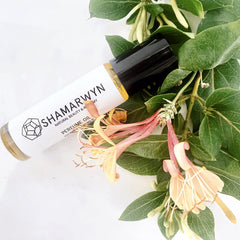 shamarwyn Honeysuckle Perfume Oil roll-on application shows convenient pocket-size scent refresh