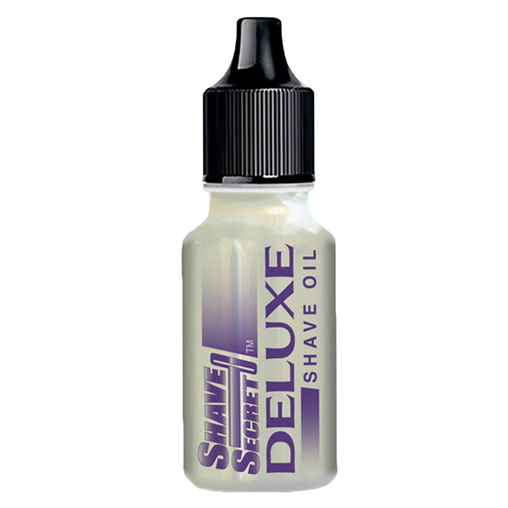 Shave Secret Deluxe Shaving Oil bottle close-up with a smooth, oil-based shave prep.