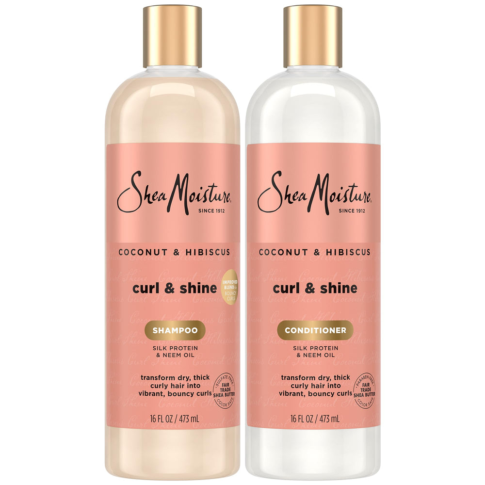 SheaMoisture Coconut & Hibiscus Shampoo bottle highlights hydration for defined curls.