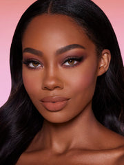 SHEGLAM Dynamatte transfer-proof finish shown on lips for smudge-resistant wear.