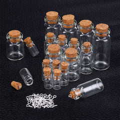 Sherli five-size clear glass bottles versatile for charms and treasures.
