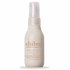 SHIBUI Replenishing Hair Oil bottle close-up with luminous shine and vegan formula.