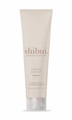 SHIBUI Taming Lotion bottle front shows frizz-control in a sleek vegan formula.