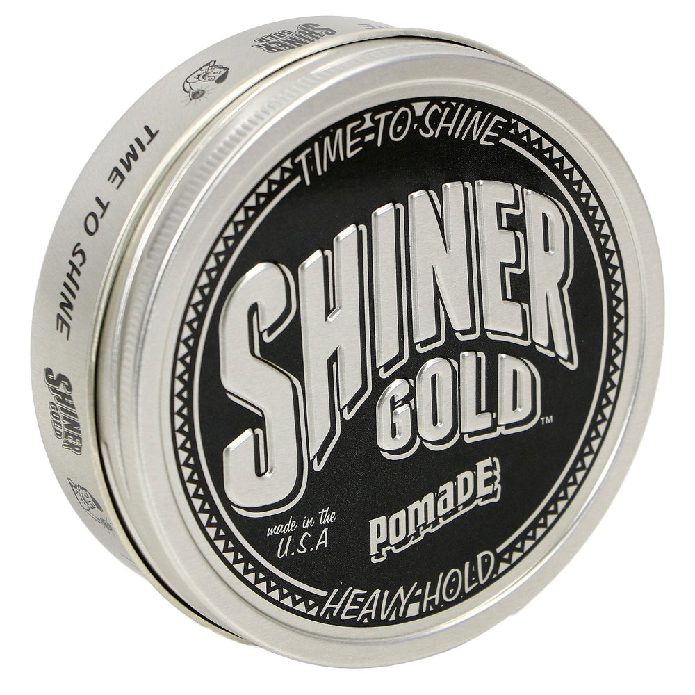 Shiner Gold Pomade bottle pour highlighting strong hold for sleek styles.