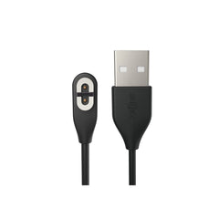SHOKZ magnetic charger cord closeup showing magnetic tip for quick, easy charging.