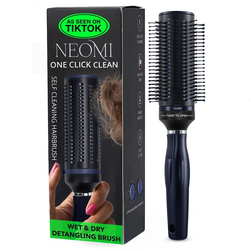 SHOP LC Detangler Brush self-cleaning mechanism enables easy debris removal after styling.