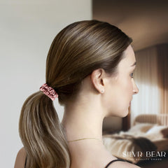 Silvr Bear navy-blue satin scrunchie offering durable hold for everyday hairstyles.