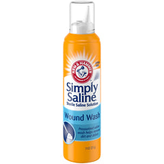 Simply Saline wound wash close-up removing dirt and debris from a minor cut